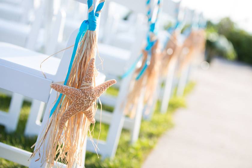 Starfish & Raffia Aisle Decor by SKO Designs at Sea Crest Beach Hotel in Falmouth, Mass. Photo by Nicole Lopez Photography