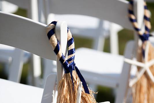 Finger Starfish & Raffia Aisle Decor at Pelham House Resort in Dennisport, Mass. Aisle decor by SKO Designs. Photography by Organic Photography.