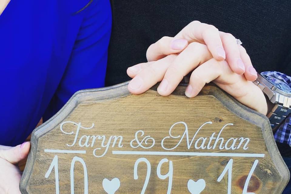 Custom save-the-date sign for an engagement shoot. Photo courtesy of Shoreshotz Weddings.