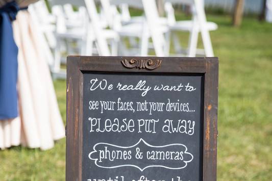 The couple wanted an unplugged ceremony. Chalkboard by SKO Designs. Photography by Organic Photography.