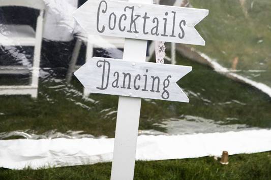 Signs helped to guide guests at this beach wedding at Pelham House Resort in Dennisport, Mass. Signs by SKO Designs. Photography by Organic Photography.
