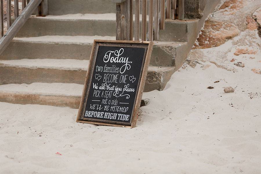 Custom Chalkboard in a rustic wood frame for a Cape Cod beach wedding ceremony at Sea Crest Beach Hotel in Falmouth, Massachusetts | Photo courtesy of Shoreshotz Weddings