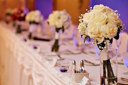 Long table setup with floral decorations