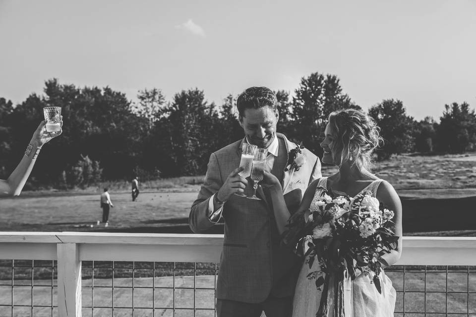 The happy couple share a toast