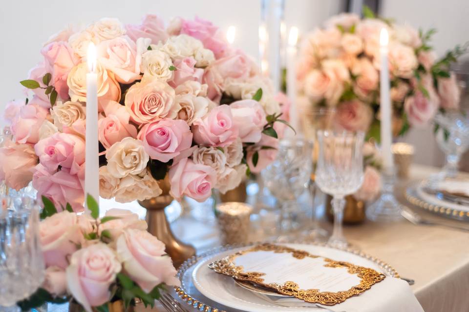 Soft pink roses with candles