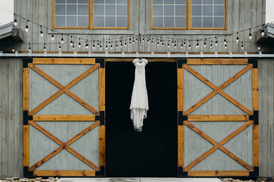 Wedding dress above barn doors