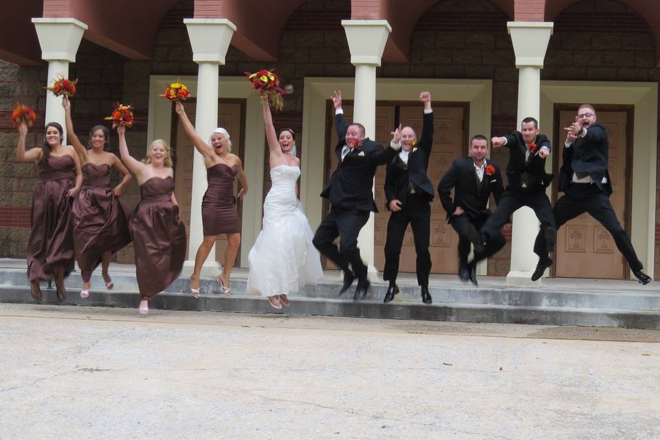 The couple with their bridesmaids and groomsmen