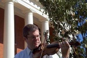 Playing violin in front of the Effingham County Courthouse.