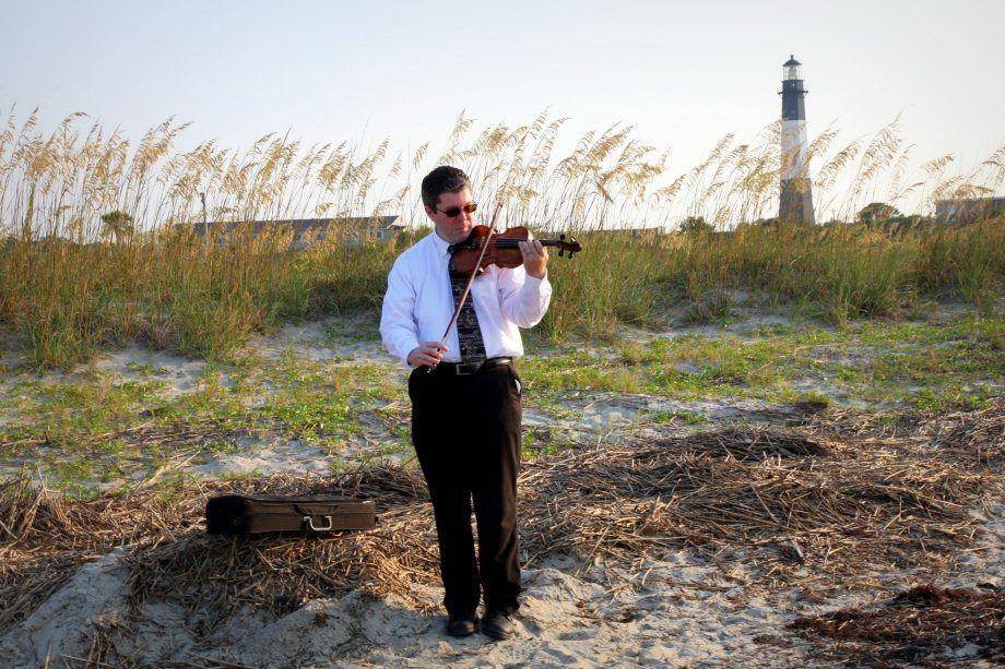 At one of my many beach weddings.