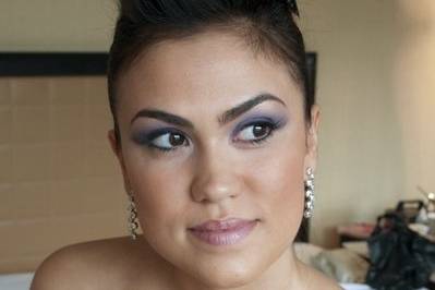 Afro Latina guest-of-honor wearing waves and semi smoky eyes