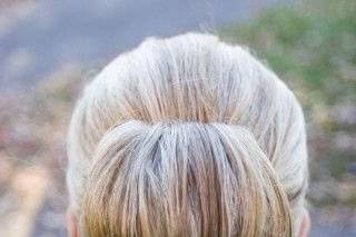 Sophisticated, Dramatic, modern Chignon with a twist.