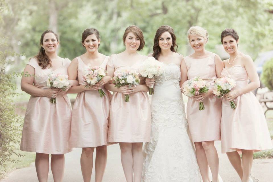 blush bridal party at an outdoor venue