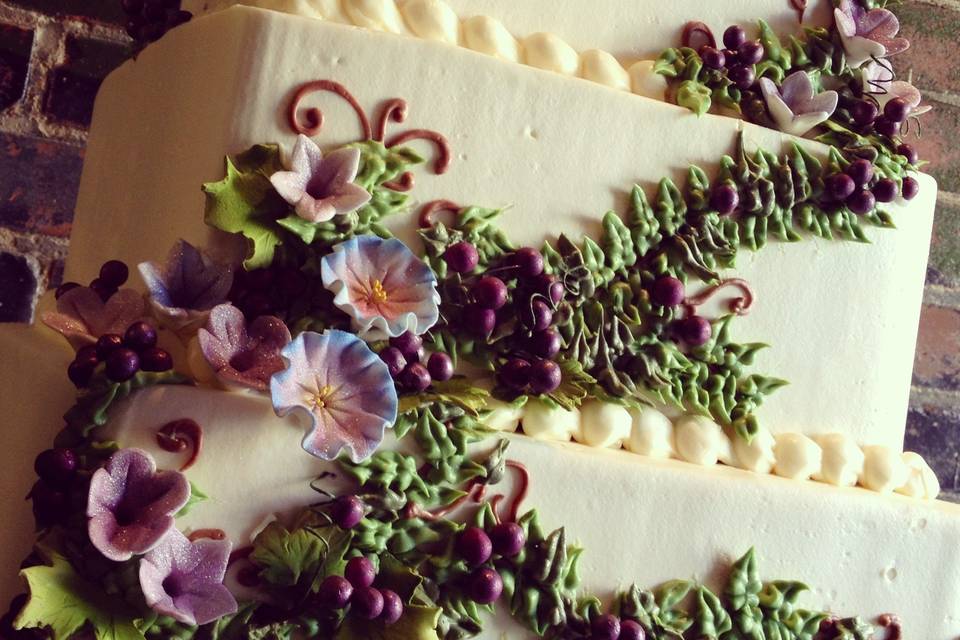 Cakes by Lynzie - Loved this wedding cake with gold leaf detail and  beautiful flowers from @boutiquebloomsdublin #weddingcake #weddingsireland  #wedding #goldleaf