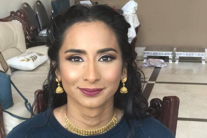 Plum tones with airbrush makeup