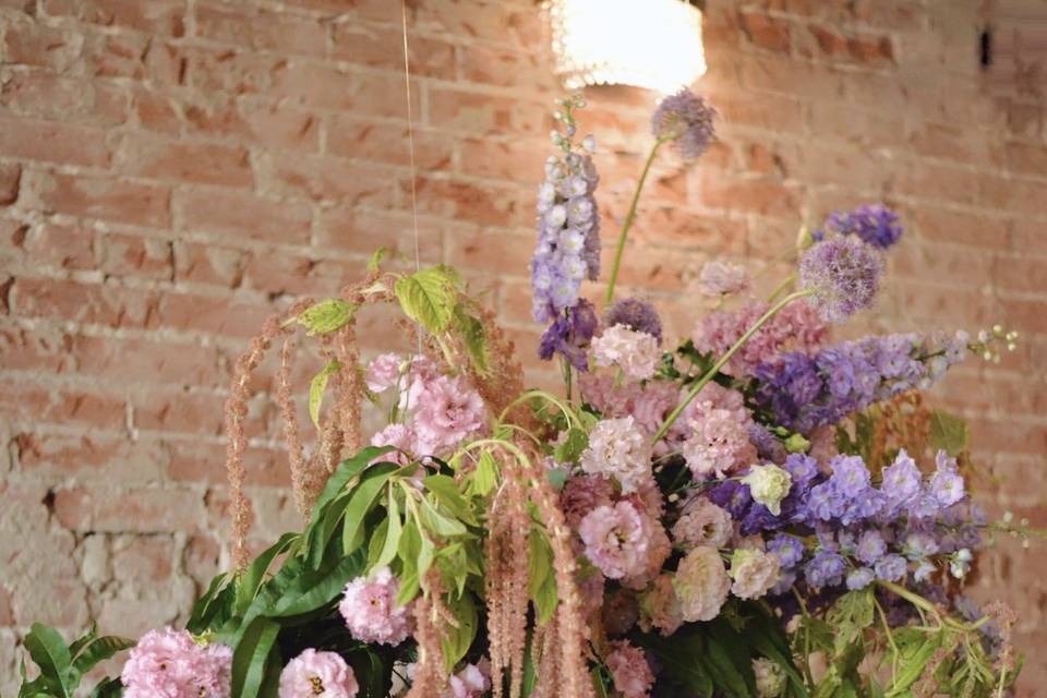 Floral work on ceremony wall