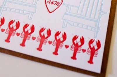 Lobster Bake invitation with charming lobsters and adirondack chairs.