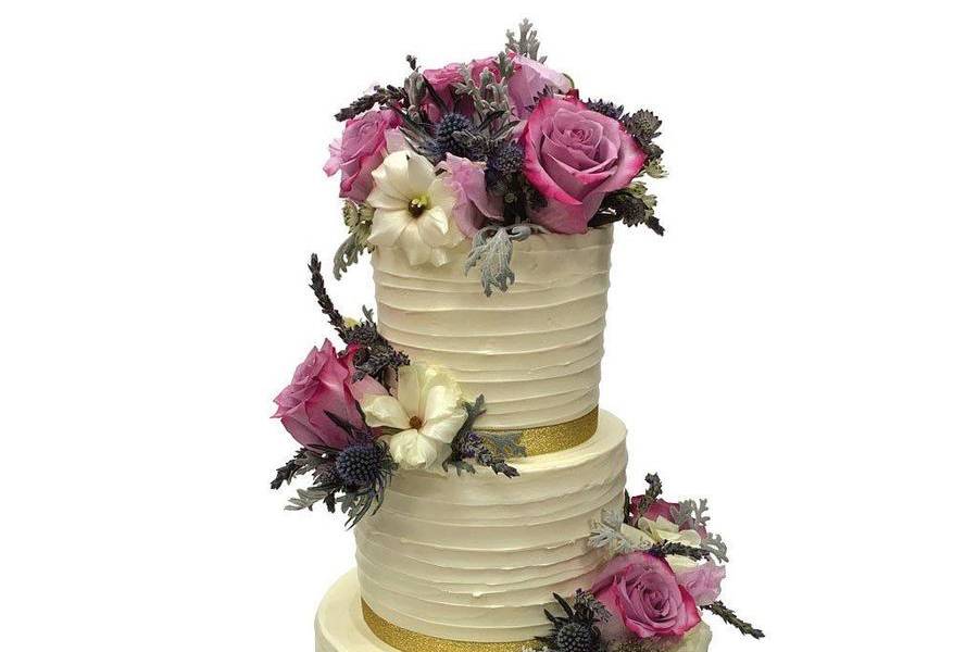 We LOVE this designer Louis Vuitton inspired wedding cake by