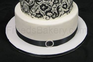 White wedding cake with black pattern