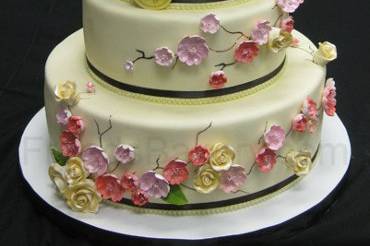 White wedding cake with pink flowers