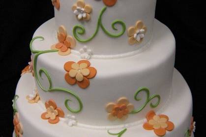 Wedding cake with orange flowers