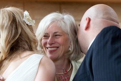 The smiling officiant