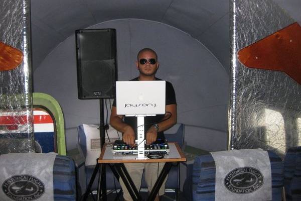 DJ Performing in the Air on WWII Plane