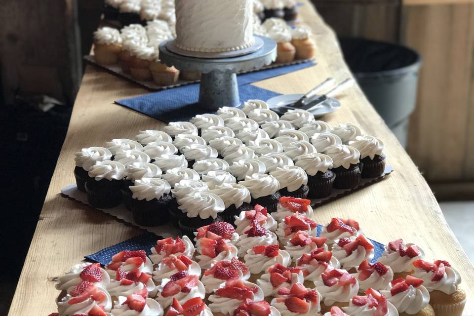 Wedding cake and cupcakes