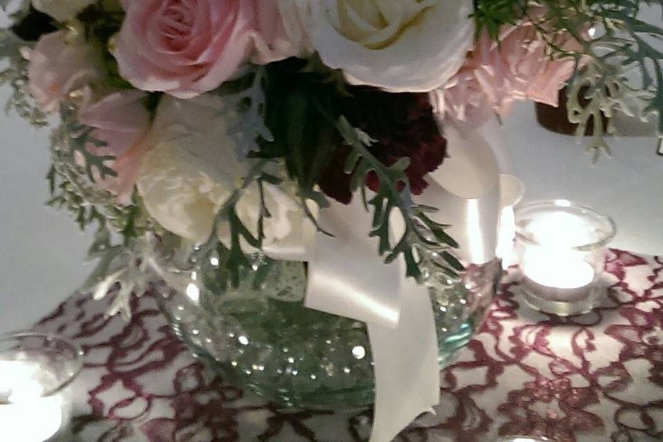 reuse bridesmaid bouquet as centerpiece