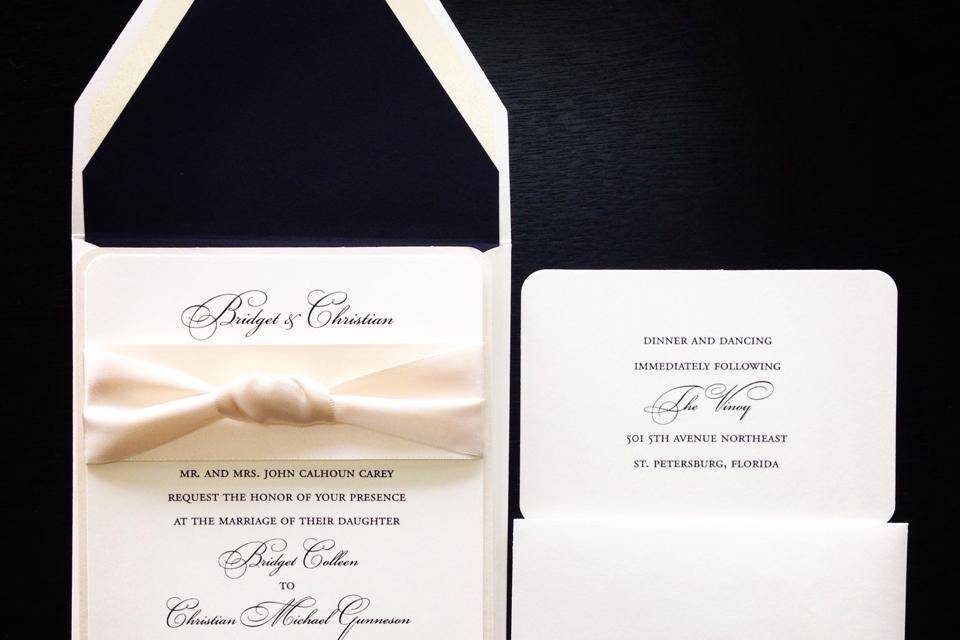Simple white invitation with ribbon
