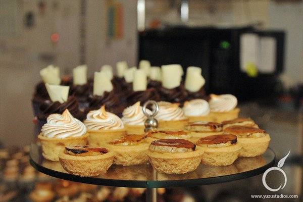 Petit Fours including caramelized banana tarts, key lime meringue tarts and mini cupcakes