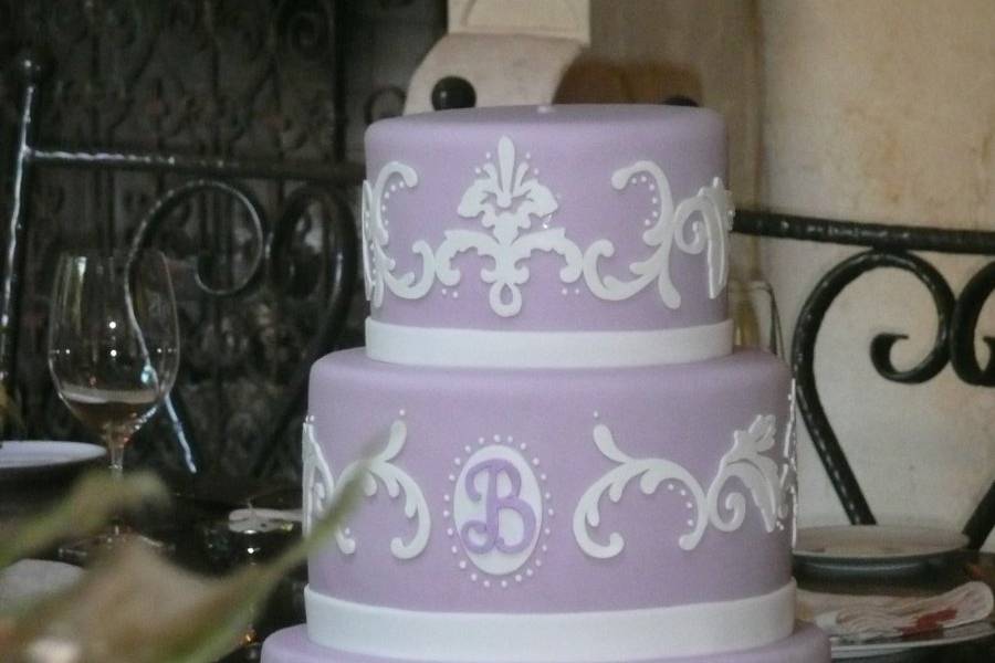 Lovely lavender cake with applique scrolls