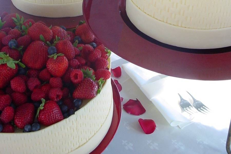 The bride and groom chose to do a plated dessert and give the wedding cake out in little boxes to their guests.