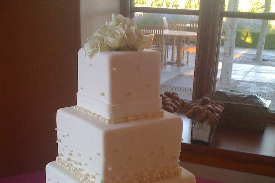 Square fondant cake with edible pearls