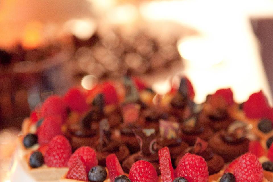 Dessert Tables!Top- Fresh local fruit tarts and Fallen Chocolate SoufflesBottom-Parisien Puffs