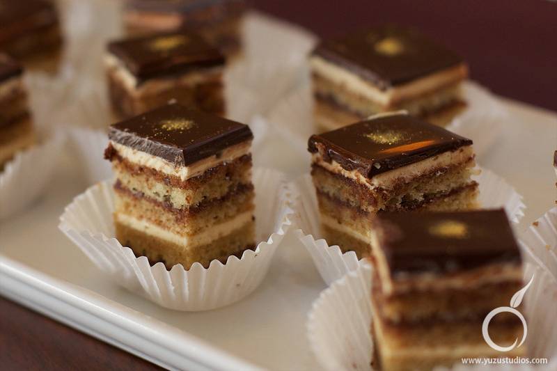 Opera- four layers of an almond jaconde soaked with rum and coffee, imbibed with rum and coffee layered with coffee buttercream and chocolate ganache.Sublime!!