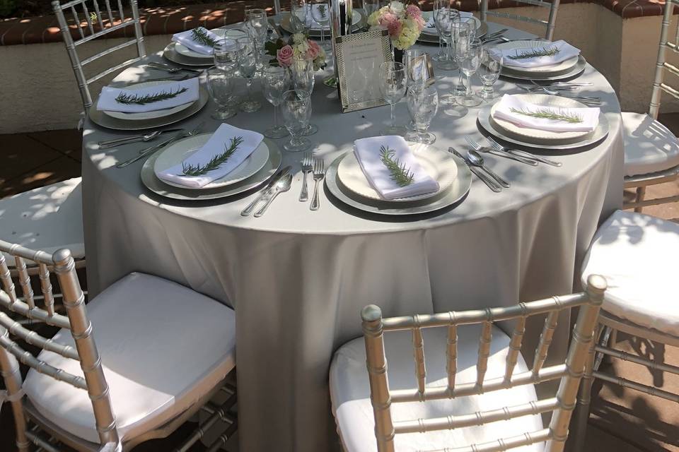 Silver tabletop in courtyard