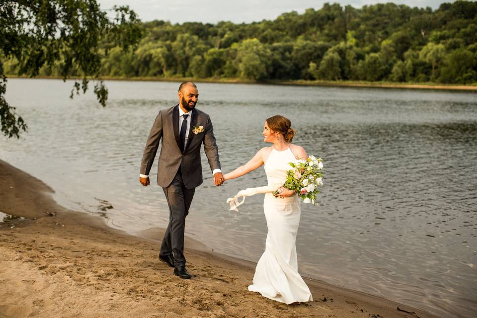 Couple walking by the river