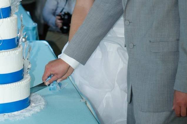 Slicing of wedding cake