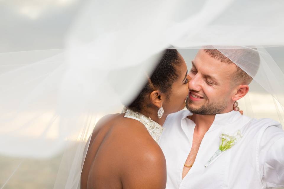 Quick Kiss Under Her Veil