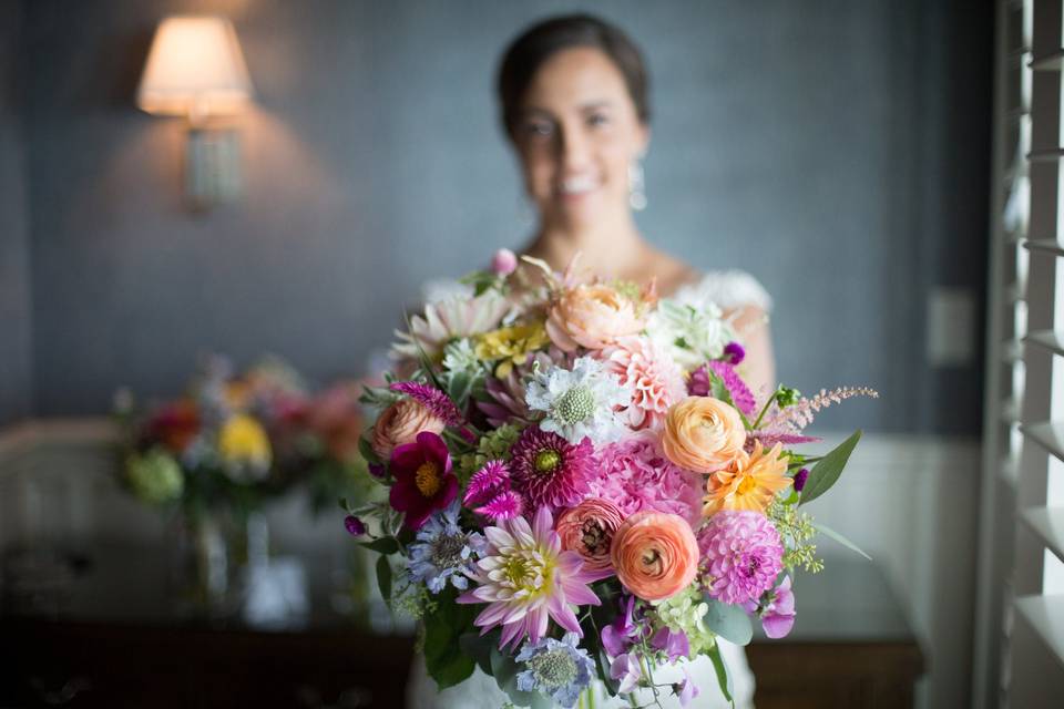 Colorful summer bride's bouquet with Dahlias at Madison Beach Hotel.