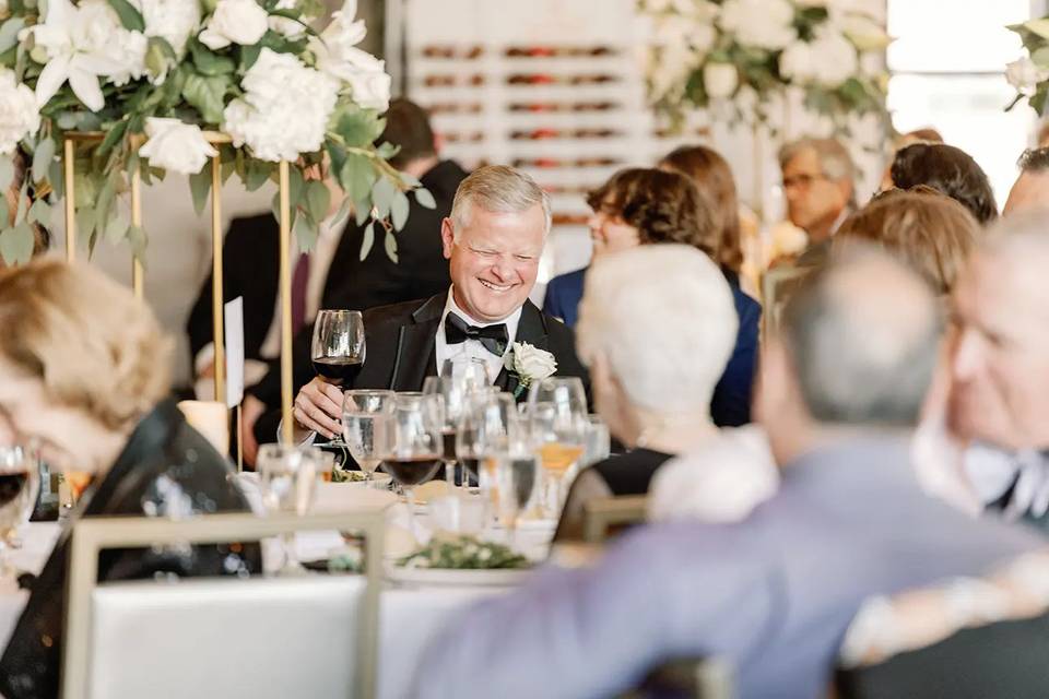 Father Laughing at Reception
