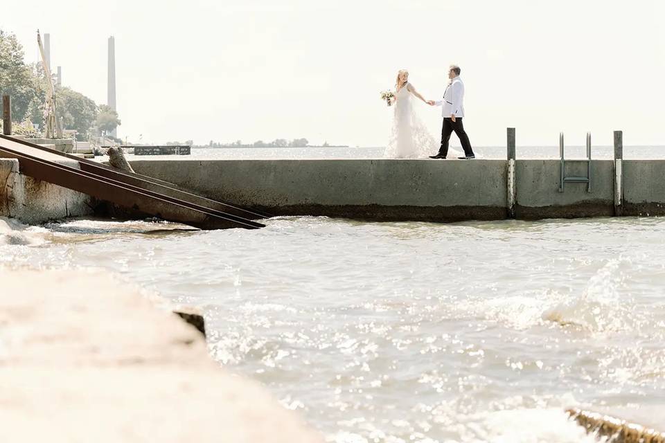 Couple Walking on a Pier