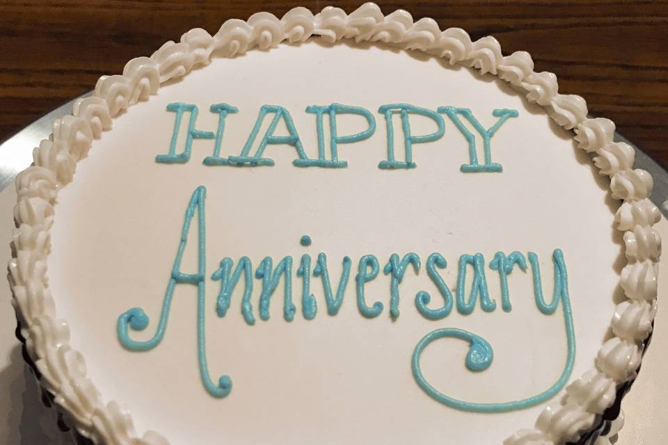 Simple Anniversary Cake with a chocolate drip