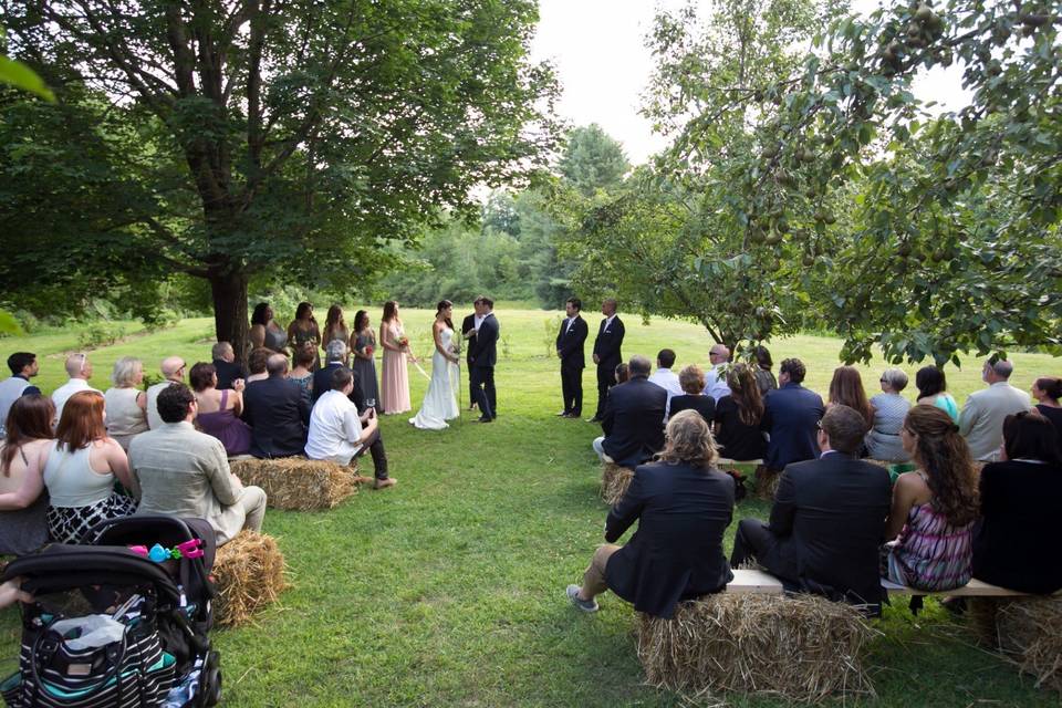 Beautiful couple and their ceremony location in the vineyard