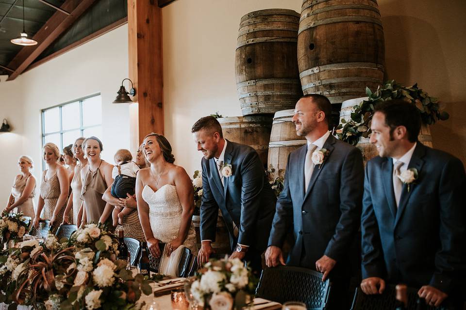 The couple with the bridesmaids and groomsmen