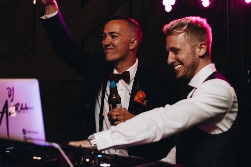 Groom taking DJ lessons