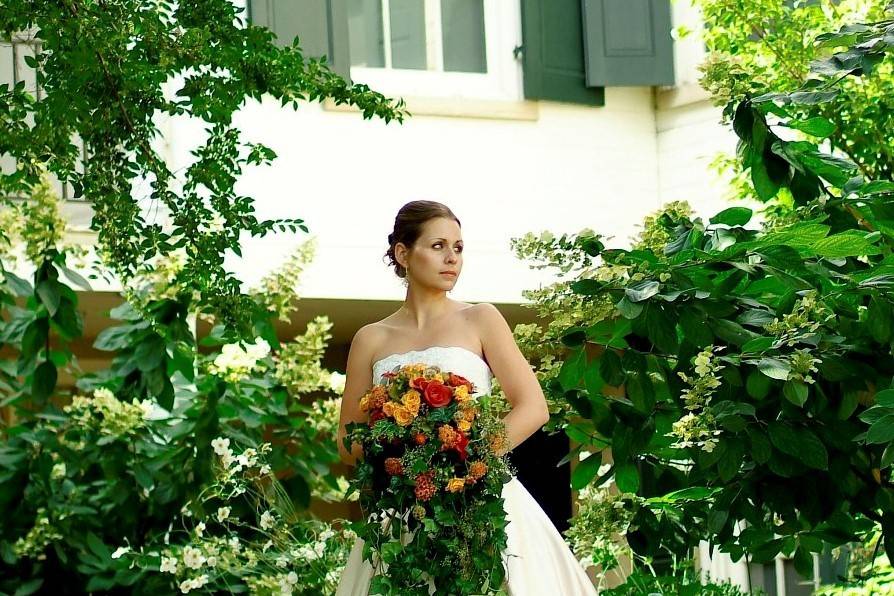 Bride holding cascading bouquet