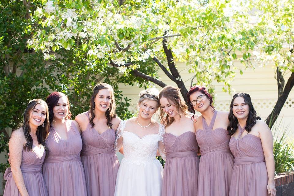 Purple-dressed wedding party