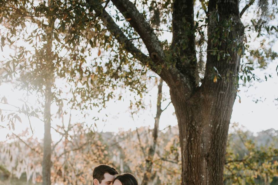 Couple during vows under Oak