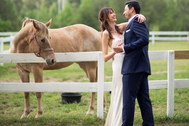 Couple and Horse in Paddock